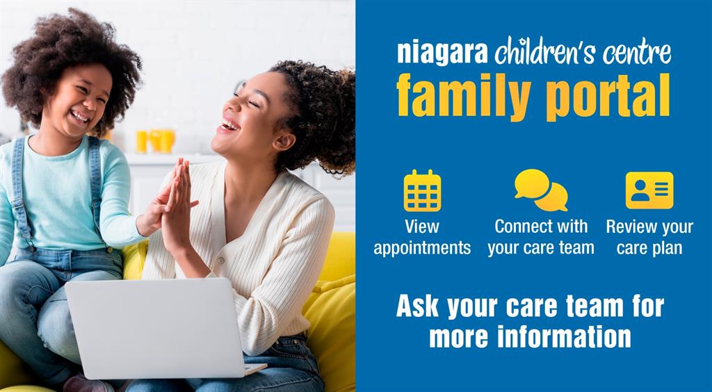 Mother and daughter high five sitting on couch