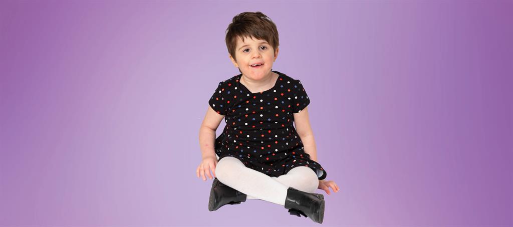 Harper, a female child with a rare genetic disorder, receives social work, occupational therapy and speech therapy services
